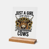 Juste une fille qui aime les vaches des Highlands (Angle)