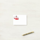 Justins handen. post-it® notes (Op bureau)