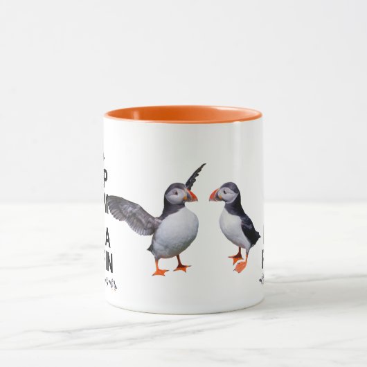 Kalm houden en een Puffin Mok vasthouden (Midden)