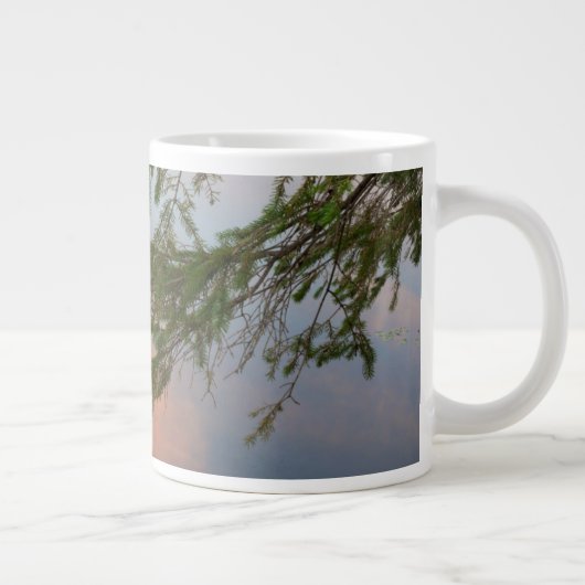 Kano op het meer bij zonsondergang in Canada Jumbo Mok (Rechts)