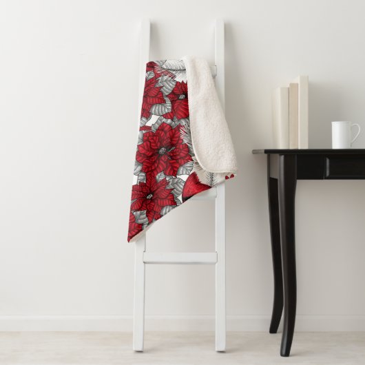 Kardinalen en poinsettia, rood en wit sherpa deken (In situ)