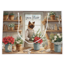 Kat arrangeert Winterbloemen voor Kerstmis 