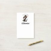 Kat dat Banjo Thunder_Cove speelt Post-it® Notes (Op bureau)