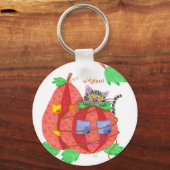 Kat die zich achter pompoenen verbergt witte ronde sleutelhanger (Voorkant)