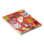 Kat en ei op rood notitieblok (Schuin)