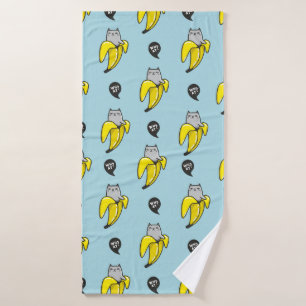 Kat in bananen badhanddoek