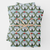 Kat in een kerstkrans inpakpapier vel (In situ)