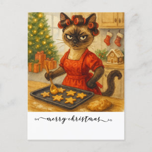 Kat kookt kerstkoekje voor Siamese kat Feestdagenkaart