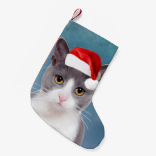 Kat met kerstcadeau voor kerstmis kleine kerstsok