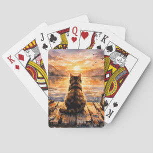 Kat op steiger bij zonsondergang pokerkaarten
