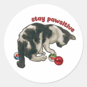 Kat speelt met KNikkers, blijf Poesitief, woordspe Ronde Sticker