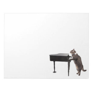 Kat spelpiano notitieblok