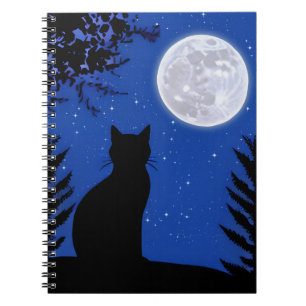 Kat staren naar de volle maan notitieboek