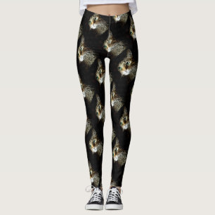 Kat voor tablet met groene ogen, geïsoleerd op zwa leggings
