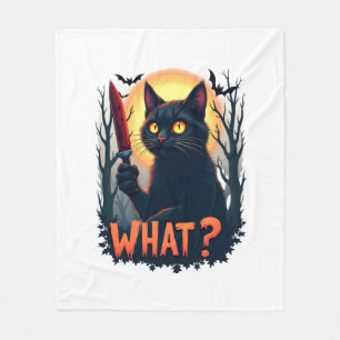 Kat wat een moorddadige zwarte kat met een kinderk fleece deken
