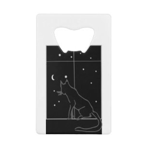 Kat zonnig zwart raam, zwarte kat. kredietkaart flessenopener