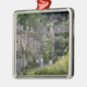 Katoesteenkool in het dorp metalen ornament (Links)