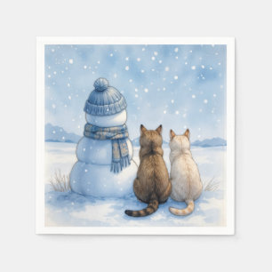 Katten die bij een sneeuwman zitten in een veld servet
