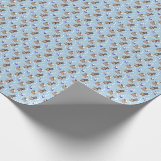 Katten in doos en melkdruppels op blauw cadeaupapier (Hoek)