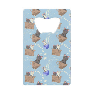 Katten in doos en melkdruppels op blauw kredietkaart flessenopener