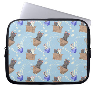 Katten in doos en melkdruppels op blauw laptop sleeve