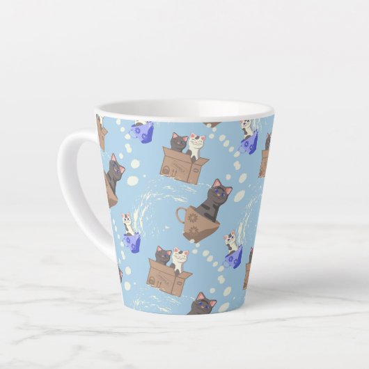 Katten in doos en melkdruppels op blauw latte mok (Linkerhoek)