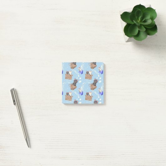Katten in doos en melkdruppels op blauw post-it® notes (Kantoor)