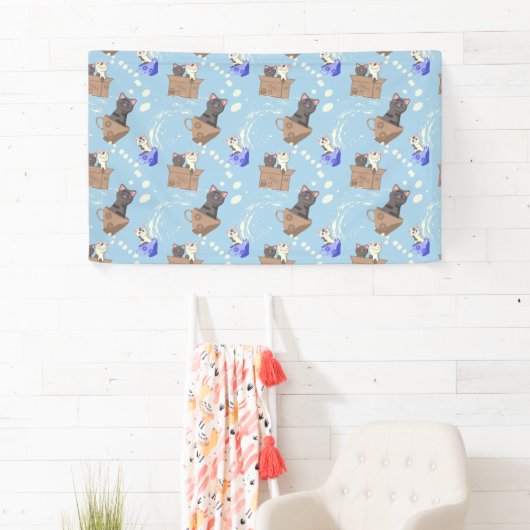 Katten in doos en melkdruppels op blauw spandoek (Insitu)