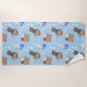 Katten in doos en melkdruppels op blauw strandlaken (Voorkant)