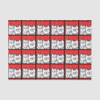 Katten in rood tissuepapier