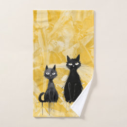 Katten op geel handdoek