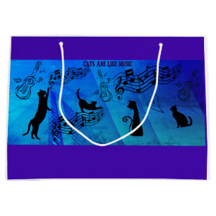 Katten zijn als muziek: muziekstaven en gitaren te groot cadeauzakje
