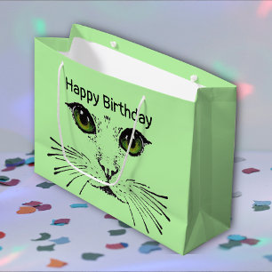 kattengezicht met groene ogen lange snorharen groot cadeauzakje