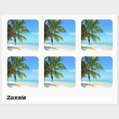 Kayak jaune sur un autocollant de plage de sable b (Feuille)