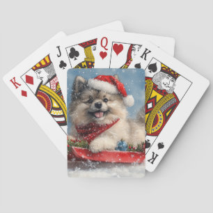 Keeshond-hond in slee Laat het sneeuwen Kerstmis Pokerkaarten