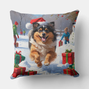 Keeshond-hond loopt in de sneeuw met kerstmuts kussen