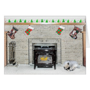 Keeshond met Kerstmis Puppy Dog met Fireplace Pain