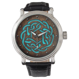 Keltische knot heeft blauw geamelleerd op de digit horloge