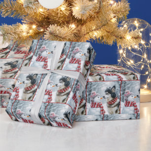 Kerst Husky hond met sneeuwpop Cadeaupapier