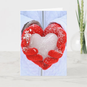 Kerst-ijs hart in rode handschoenen feestdagen kaart