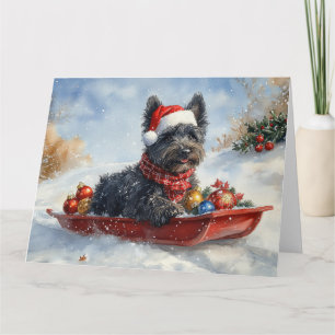 Kerst met Bouvier des Flandres-hond in slee Kaart