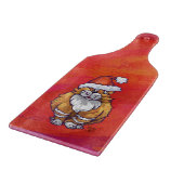 Kerst met gemberkat op rood snijplank (Hoek)