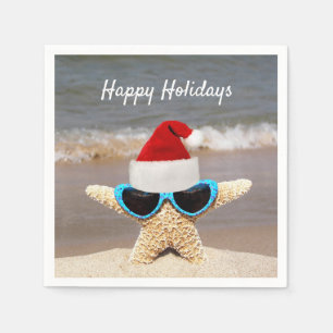 Kerst pet op tropische zeester op het strand servetten