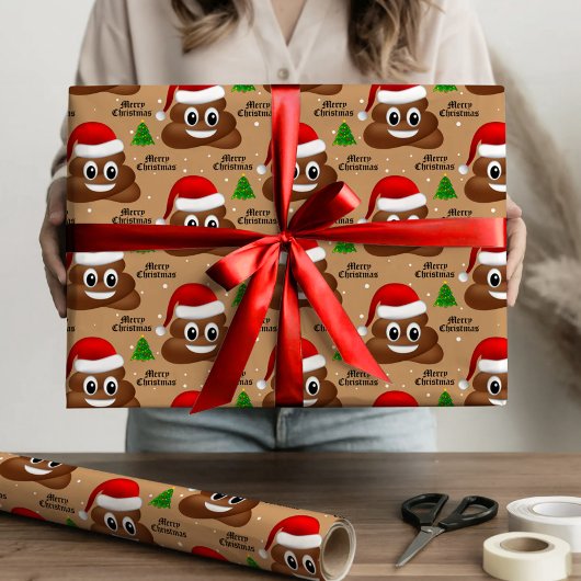 Kerst poep emoji met kerstmuts inpakpapier