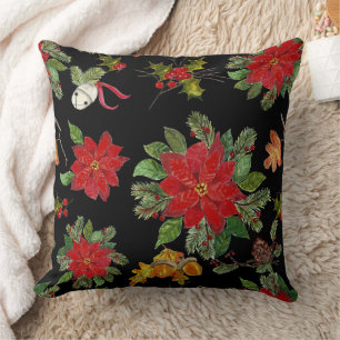 Kerst poinsettia en zilveren klokken kussen