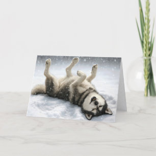 Kerst Siberische Husky maakt een sneeuwengel Feestdagen Kaart