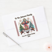 Kerst sticker op een verpakt geschenk (Envelop)