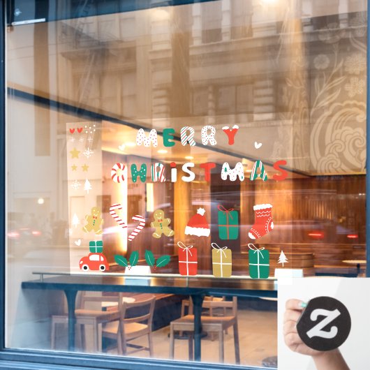 Kerst stickers aan de voorzijde van de winkel 01 (Cafe Raam)