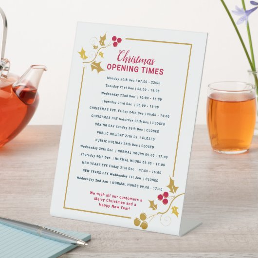 Kerst zakelijke openingstijden, gouden rode hulst reclamebord met voetstuk (Insitu)