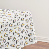 Kerstakerpinguïns op witte kerst tafelkleed (Voorbeeld)